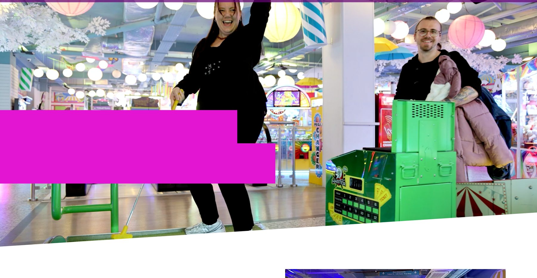 Family enjoying arcade games at Blackpool Amusements